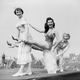Illustration for article titled Here's Audrey Hepburn As a Chorus Girl Balancing Her Friend's Butt on a Block of Ice
